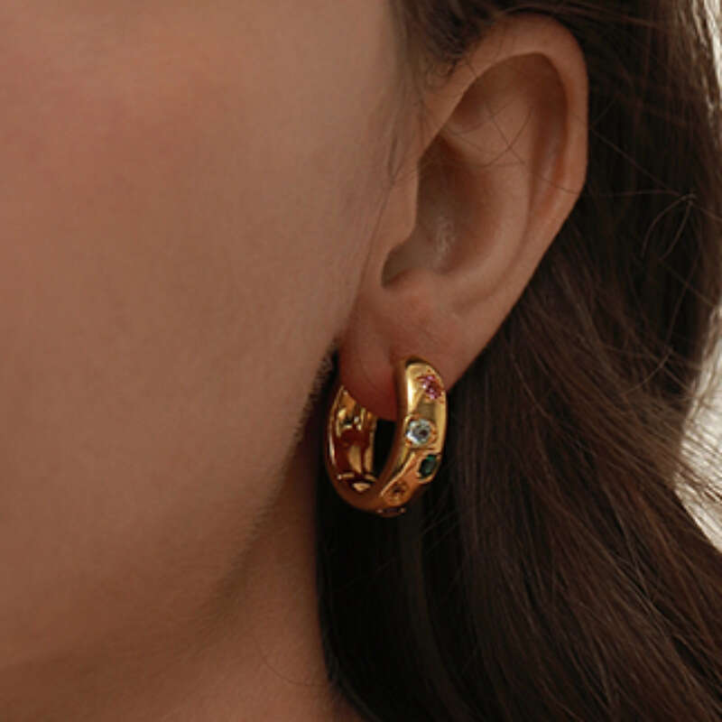 DH collections Ins - style Colorful Cubic Zirconia Ear Hoops. These luxurious polygon - shaped ear cuffs feature a unique U - shaped and geometric des