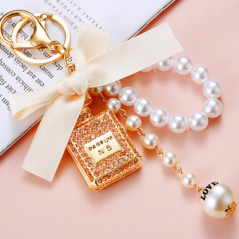 keychain pearl perfume bottle bowknot car for women cute creative bag pendant keychain ring with Inlaid diamonds gift mini bag keychain