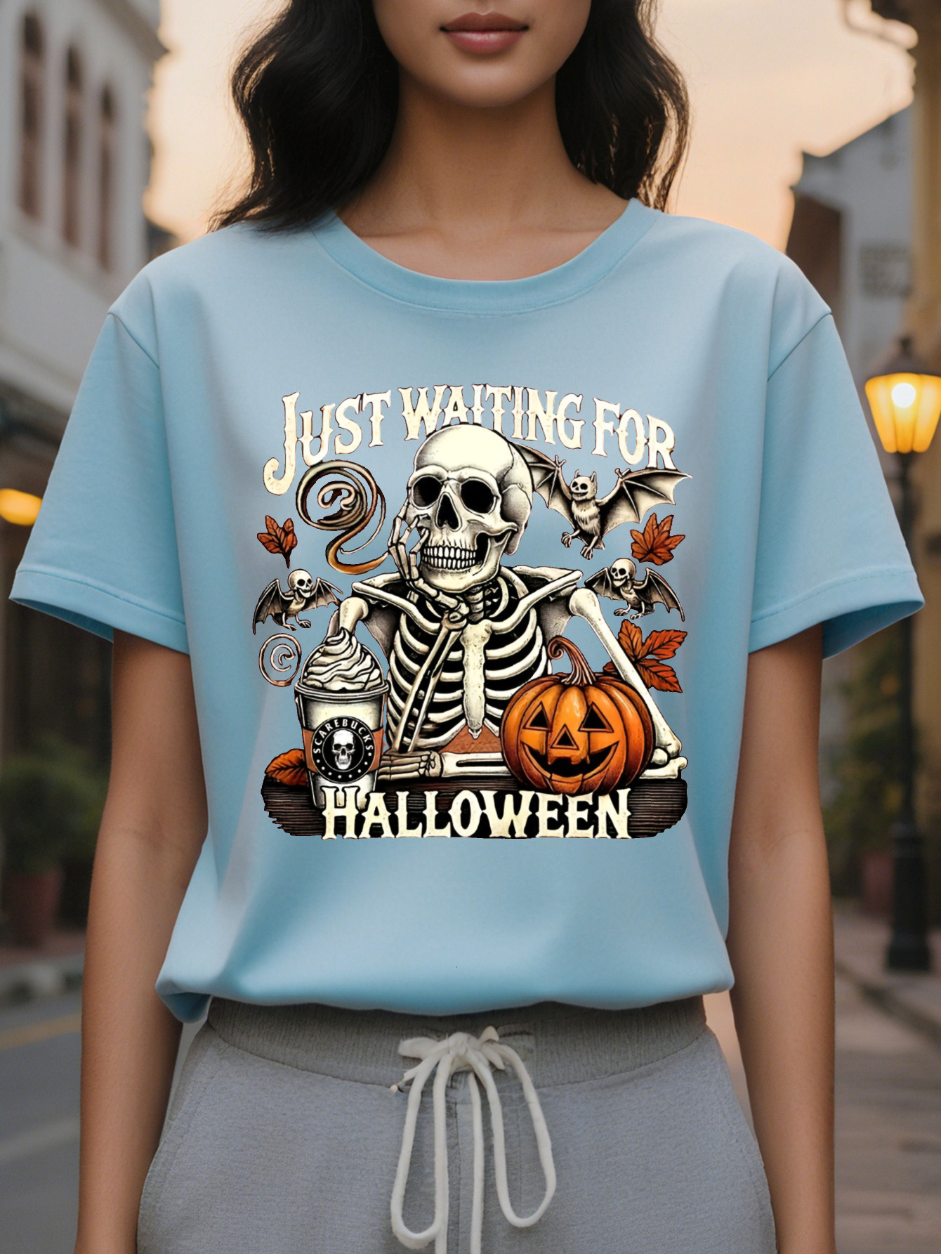 Women's Graphic T-Shirt Spooky Skeleton Jack O Lantern Print with Just Waiting Halloween Slogan Round Neck Short