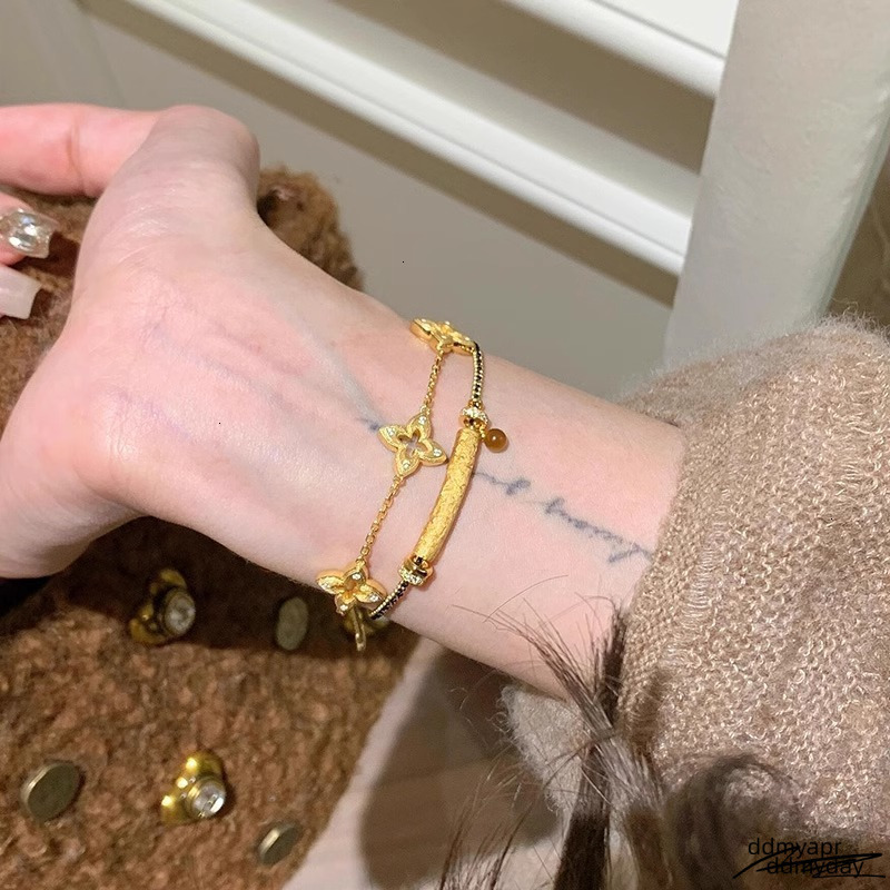 2025 New Retro Hollowed-Out Brushed Four-Leaf Clover Bracelet Designer Jewelry Wedding Ddmyday Ring Fashionable Elegant Simple And High-End Collarbone