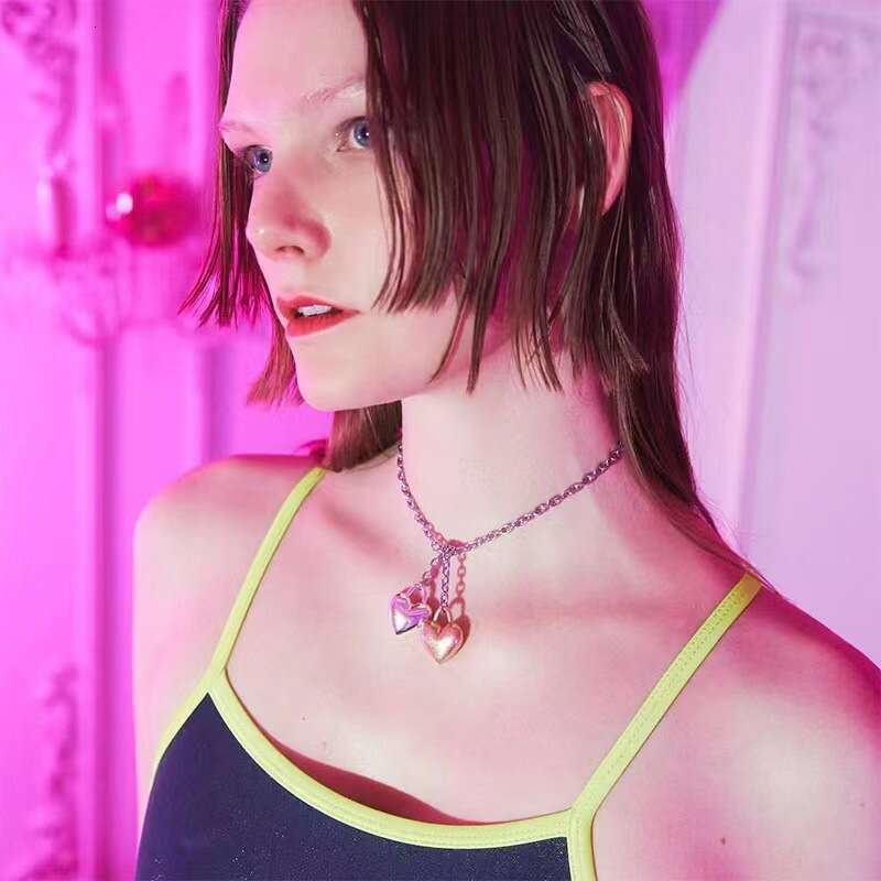 DHcollections Stylish Gold and Silver Exaggerated Heart - shaped Necklaces for Women. Copper - plated with real gold