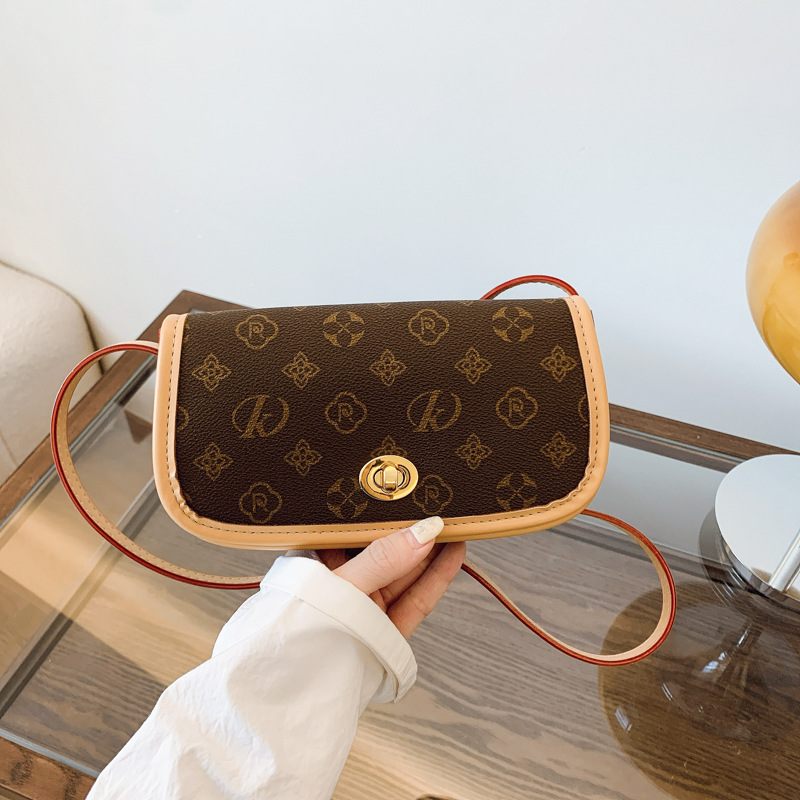 High-end bag for women 2025 new retro fashion temperament printed saddle bag temperament versatile shoulder messenger bag