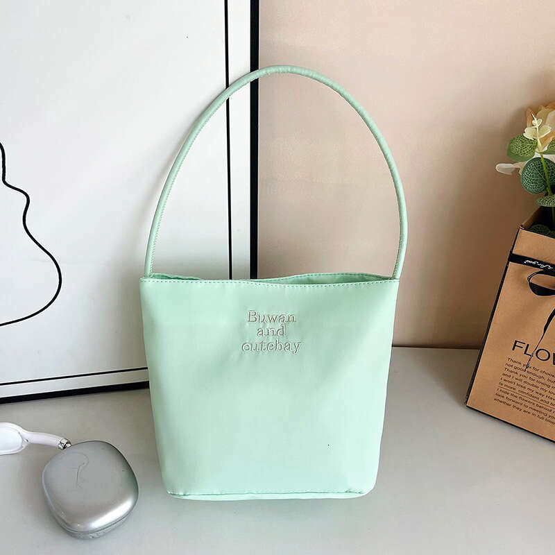 2025 Summer New Simple Nylon Underarm Korean Niche Design Letter Embroidery Handheld Commuter Bucket Bag