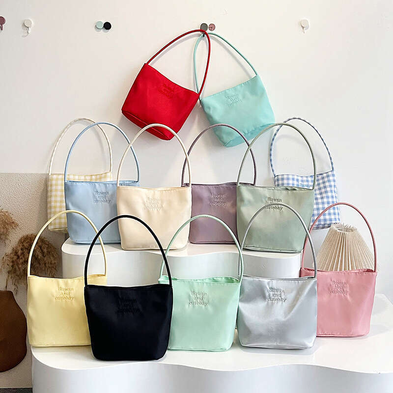 2025 Summer New Simple Nylon Underarm Korean Niche Design Letter Embroidery Handheld Commuter Bucket Bag