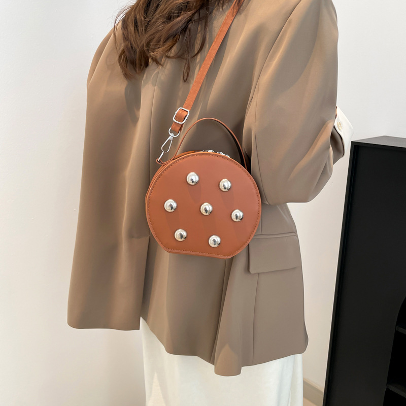 2025 autumn new fashion trend niche design casual simple versatile small round bag crossbody bag designer shoulder bag
