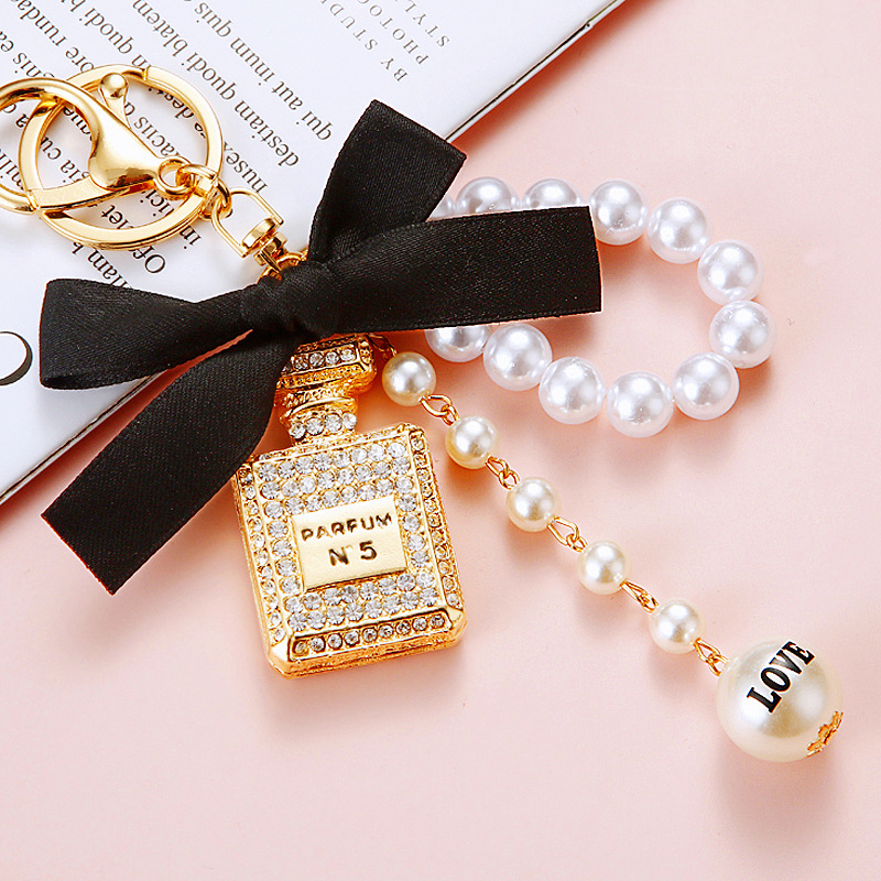 keychain pearl perfume bottle bowknot car for women cute creative bag pendant keychain ring with Inlaid diamonds gift mini bag keychain