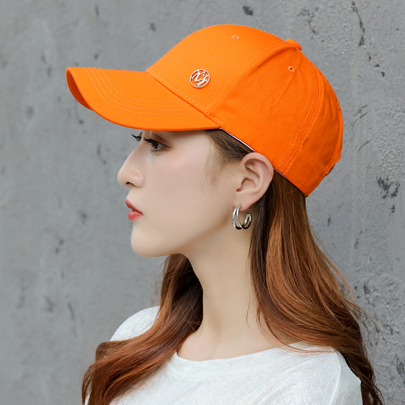 Cotton baseball cap, foreign trade style, with metal logo, fashionable and versatile, unisex style