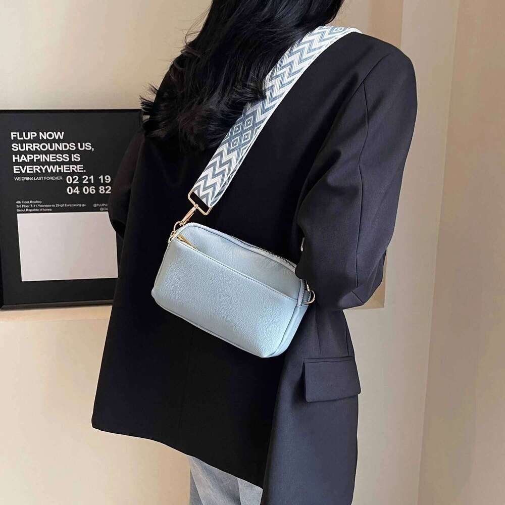 This Is A Super Practical Messenger Bag Fashion Wide Shoulder Strap Design Suitable For Going Out Shopping