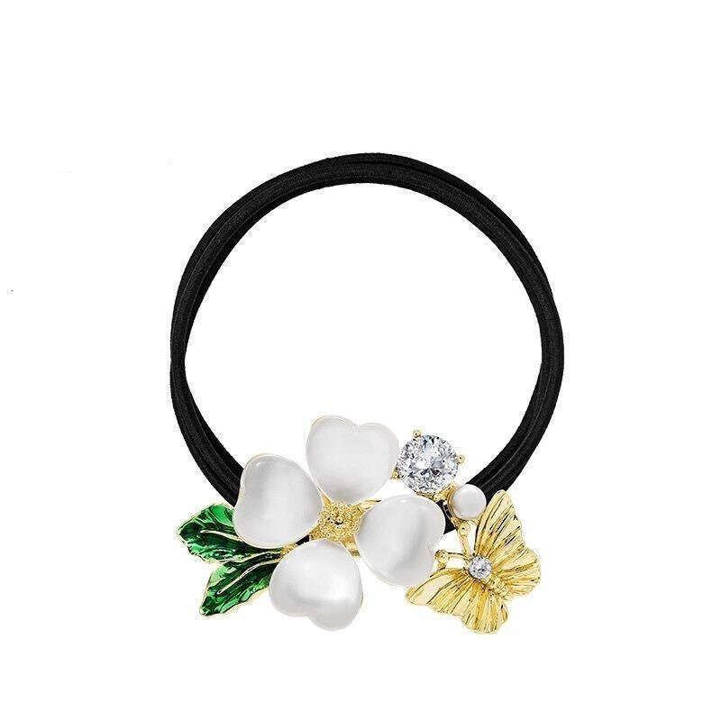 DHcollections 2025 Elegant Rhinestone Hair Tie Korean High Elastic Rubber Band Ponytail Holder White Flower Camellia Alloy Hair Accessory for Women