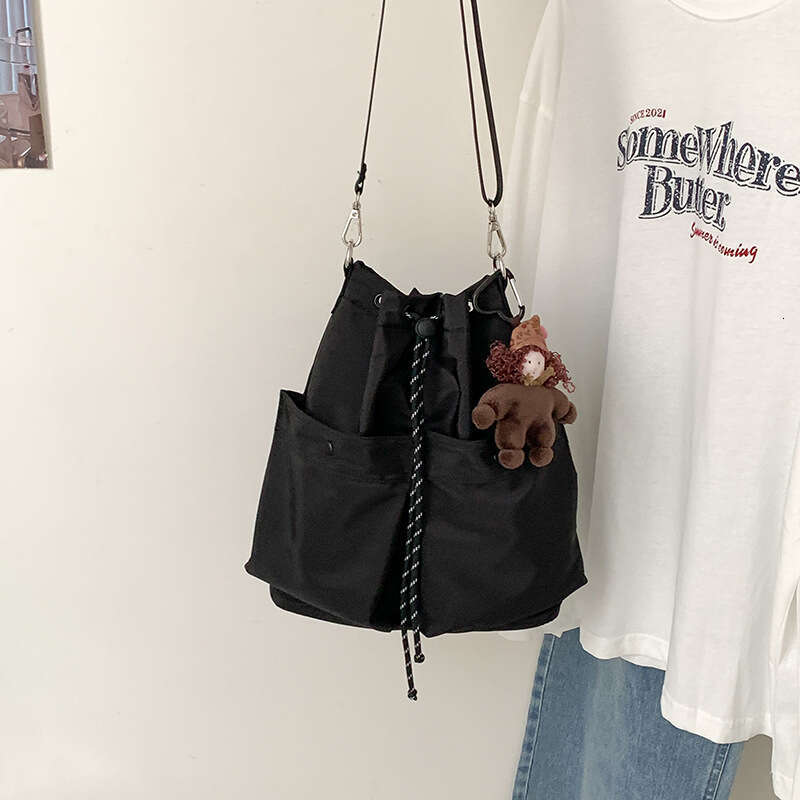 Nylon Commuter Tote for Women, Korean Japanese Style, 2025 Autumn and Winter New Drawstring Simple Versatile Shoulder Crossbody Bag