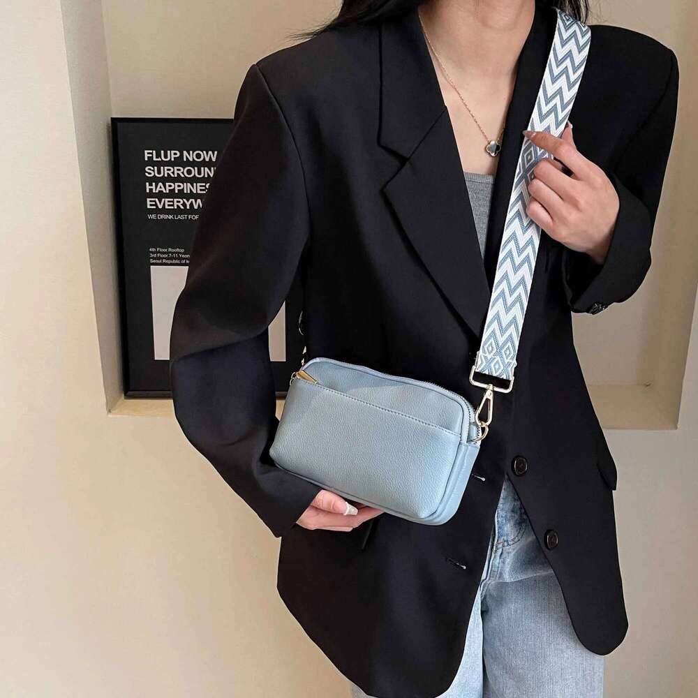 This Is A Super Practical Messenger Bag Fashion Wide Shoulder Strap Design Suitable For Going Out Shopping