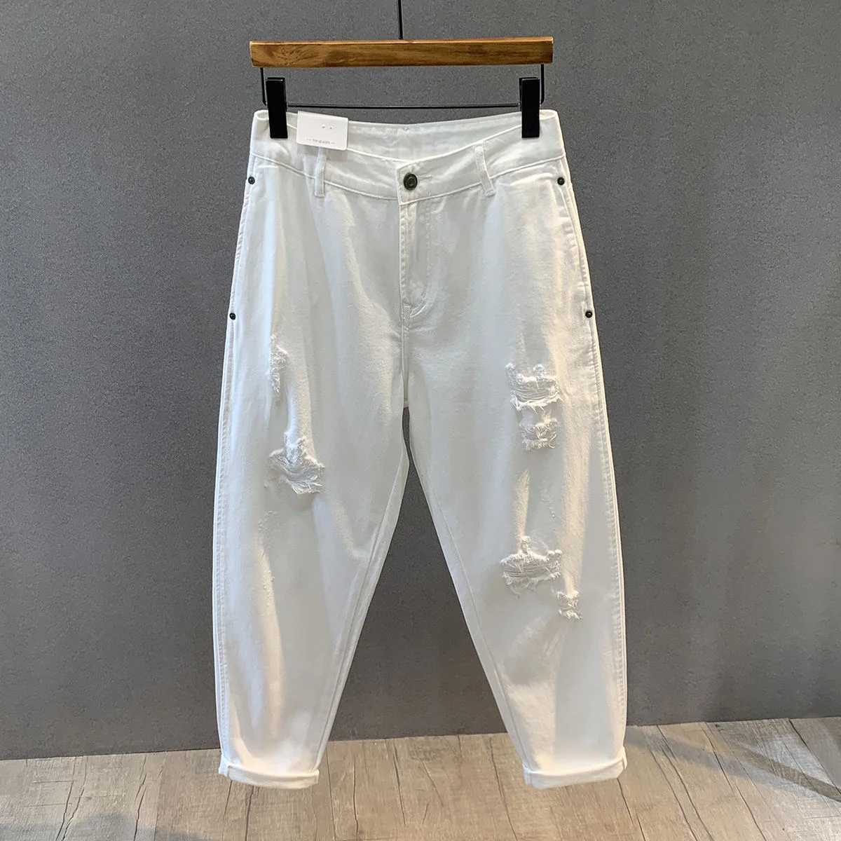 2023 Spring and Autumn New Fashion Solid Color Ripped Jeans Mens Casual Loose Comfortable HighQuality Large Size Trousers 36 W250905