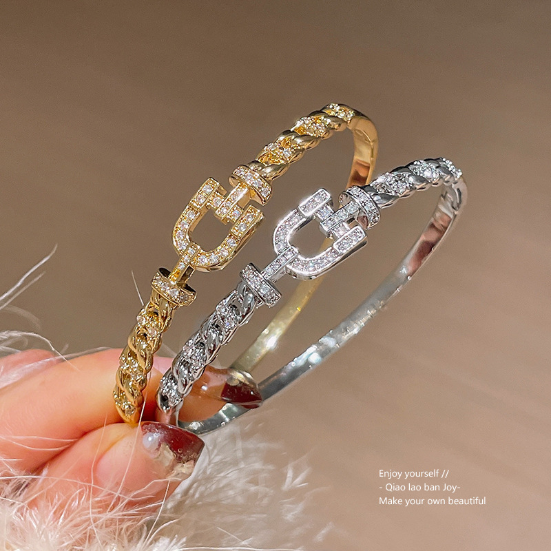 Gold Tone Bangle With Signature Buckle Motif, Sparkling Crystal Detailing & Braided Chain Texture Luxury Elegant Style Daily & Formal Wear Gift For He