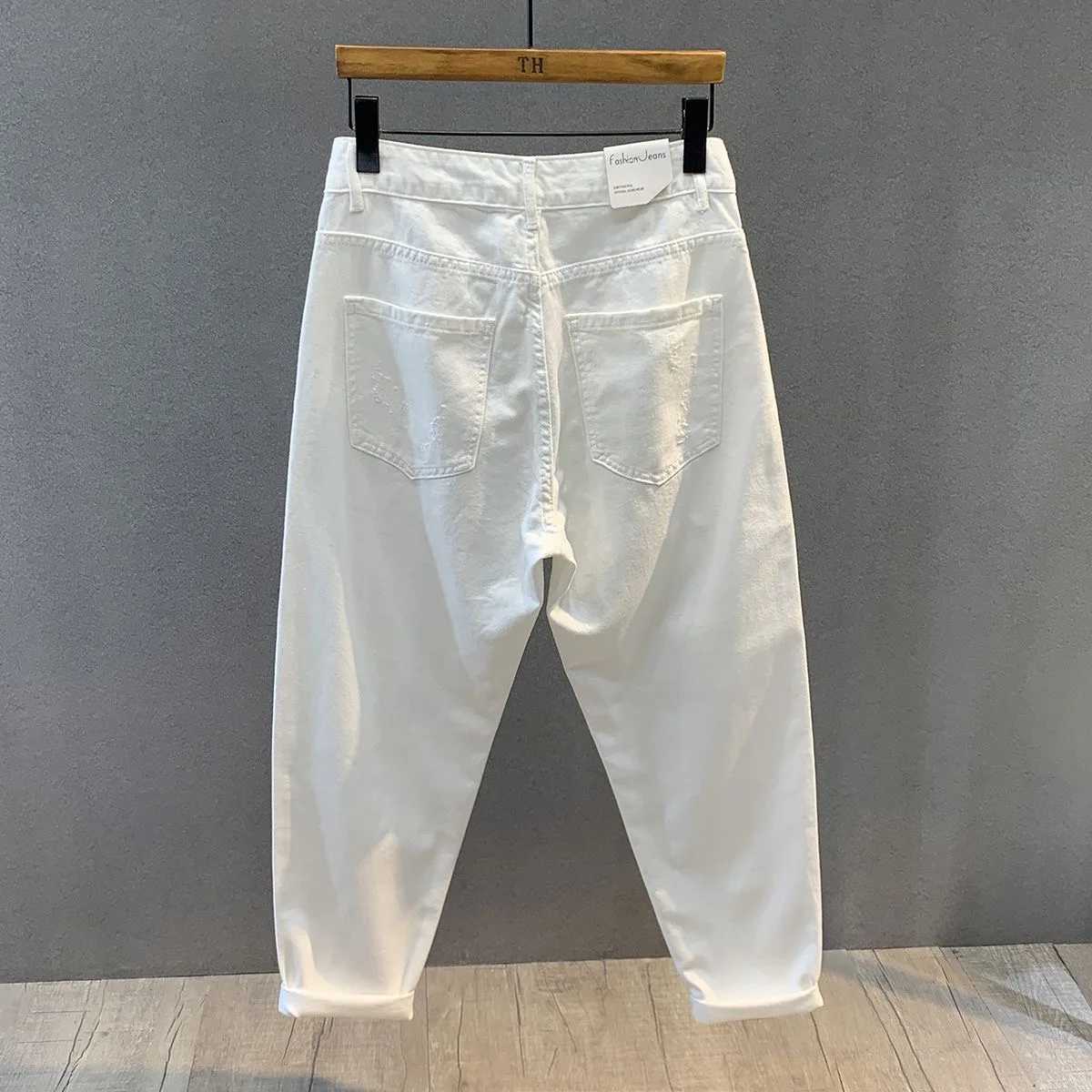 2023 Spring and Autumn New Fashion Solid Color Ripped Jeans Mens Casual Loose Comfortable HighQuality Large Size Trousers 36 W250905