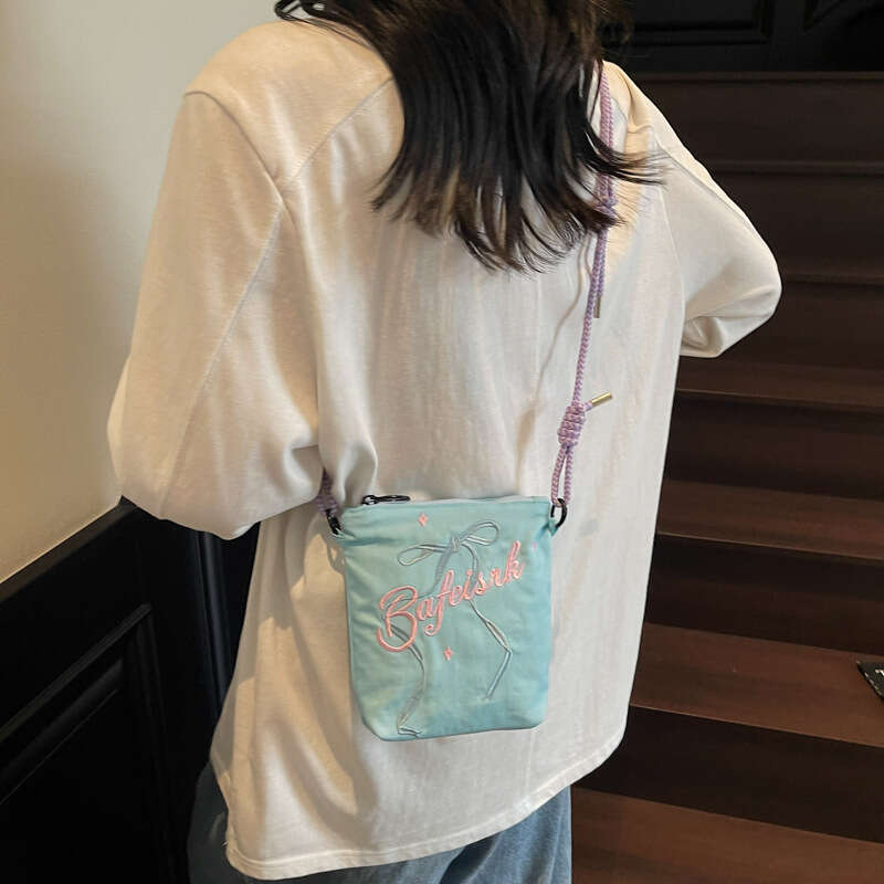 Summer Bowknot Crossbody Phone Bag for Women 2025 New Versatile Lightweight Commuter Tote Single Shoulder Coin Purse