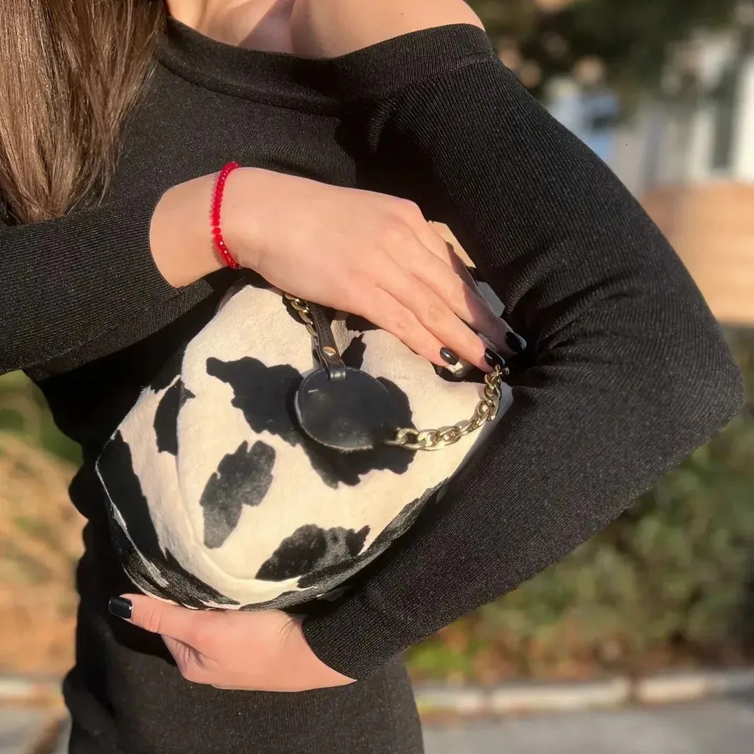 LOST IN VINTAGE Suede Cow Pattern Fabric Clutch Metal Frame Kiss Lock and Handle Puffy Purse 34x23x11cm Plush 250905