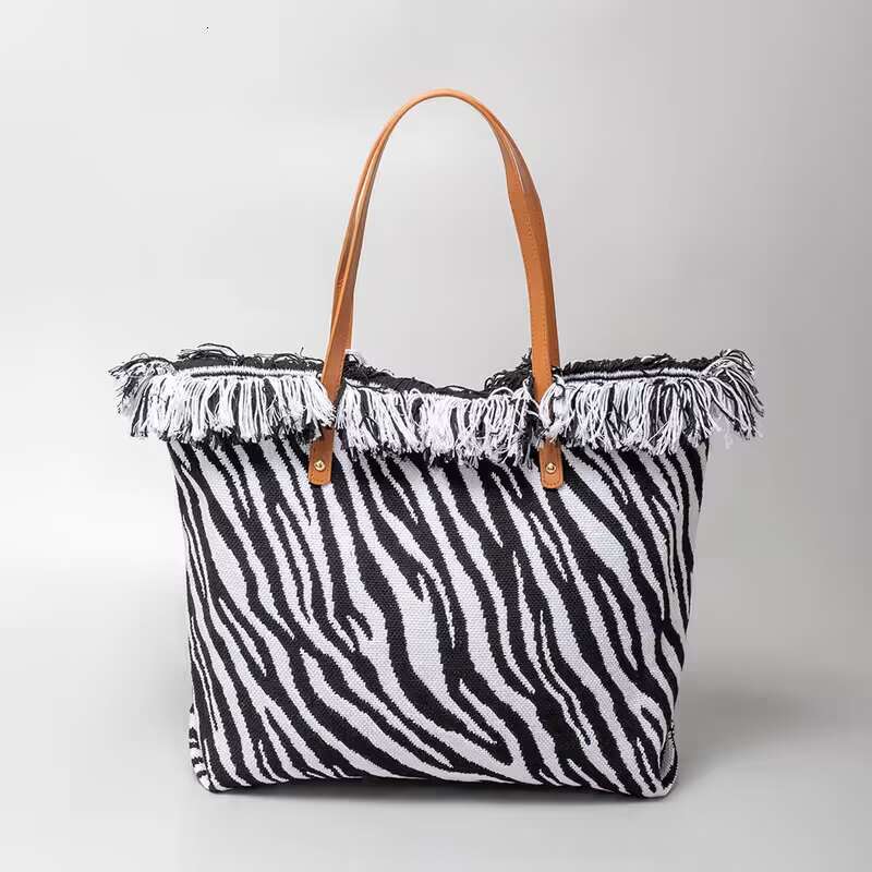 Large-Capacity Canvas Tote For Women, New Single-Shoulder Beach Bag With Fringe Embroidery, Featuring A Unique And Niche Design.