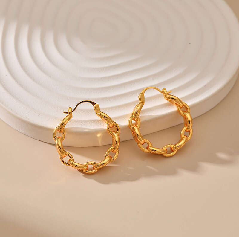 Minimalist interlocking hollowed-out chain design ear loops, European and American fashionable OL ear loops