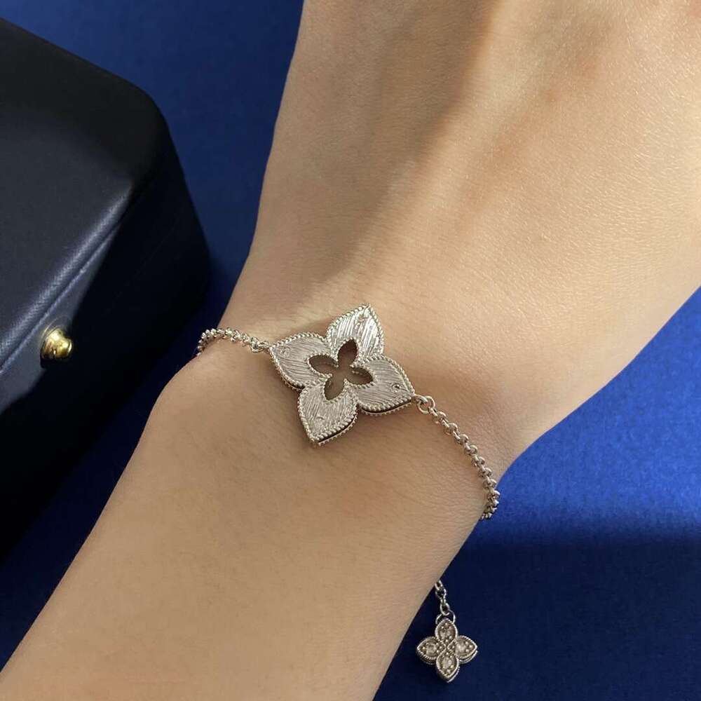 RC Dia-Shaped Four-Leaf Inlaid with Small White Dias Brushed Metal Hollow Filigree Carved Single Flower Bracelet