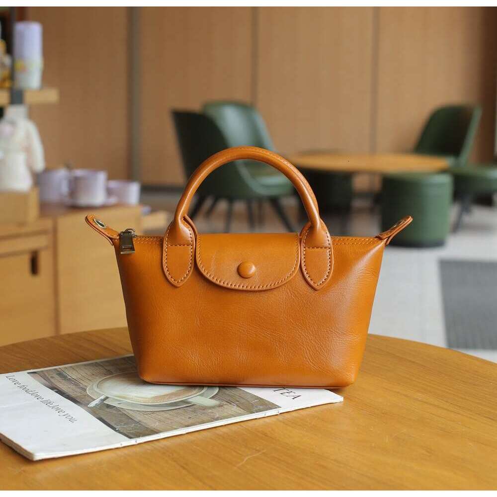 New Top Layer Vegetable Tanned Dumpling Versatile Women's Crossbody Small Bag Genuine Leather Handbag 77158