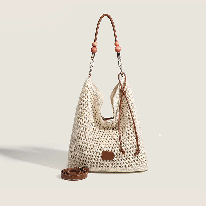 Shanxia Nanfeng Woven Women's Handheld Straw Large Capacity Beach Vacation Hollow Summer Shoulder Bag