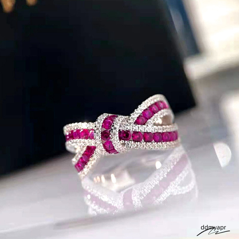 2024 Choucong Brand Wedding Rings Ddmydec Classical Jewelry Sterling Sier Blue Sapphire Round Cut Zircon CZ Dia Elegant Bow Women Cross Band Ring Gift