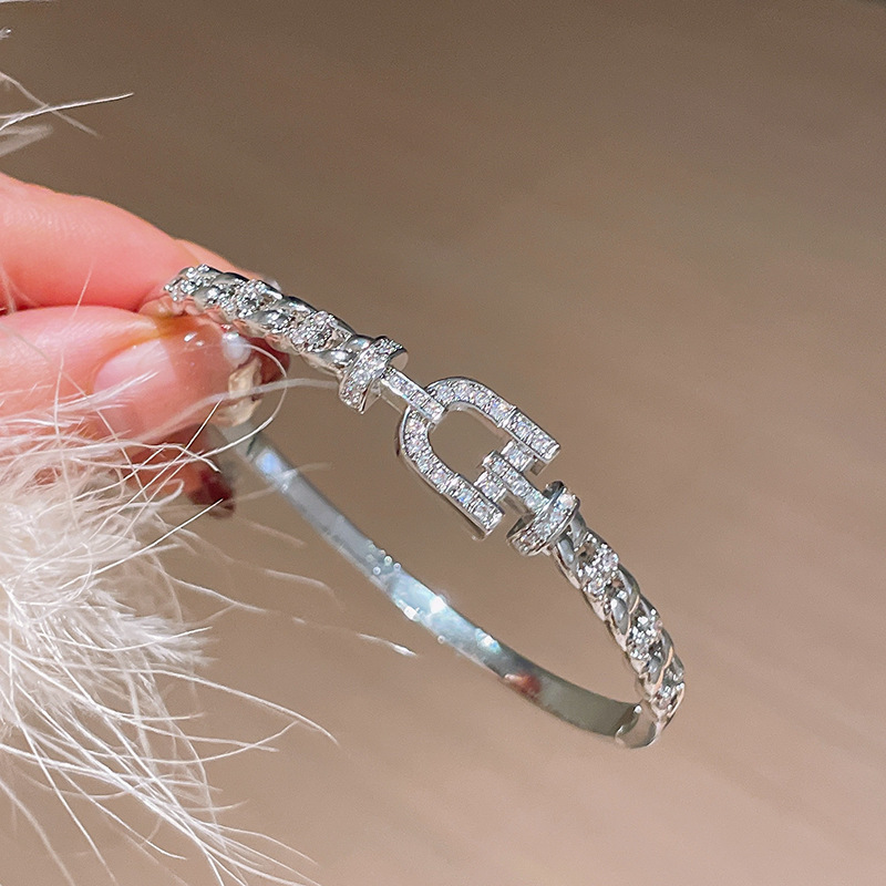 Gold Tone Bangle With Signature Buckle Motif, Sparkling Crystal Detailing & Braided Chain Texture Luxury Elegant Style Daily & Formal Wear Gift For He