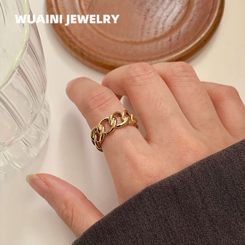 A fashionable hollowed-out ring for women, exuding a unique and high-end charm, with a distinctive and individualistic style. It's a closed-mouth