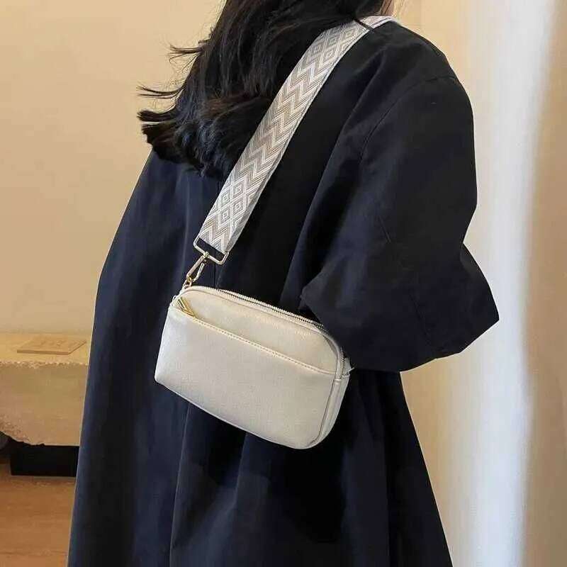 This Is A Super Practical Messenger Bag Fashion Wide Shoulder Strap Design Suitable For Going Out Shopping