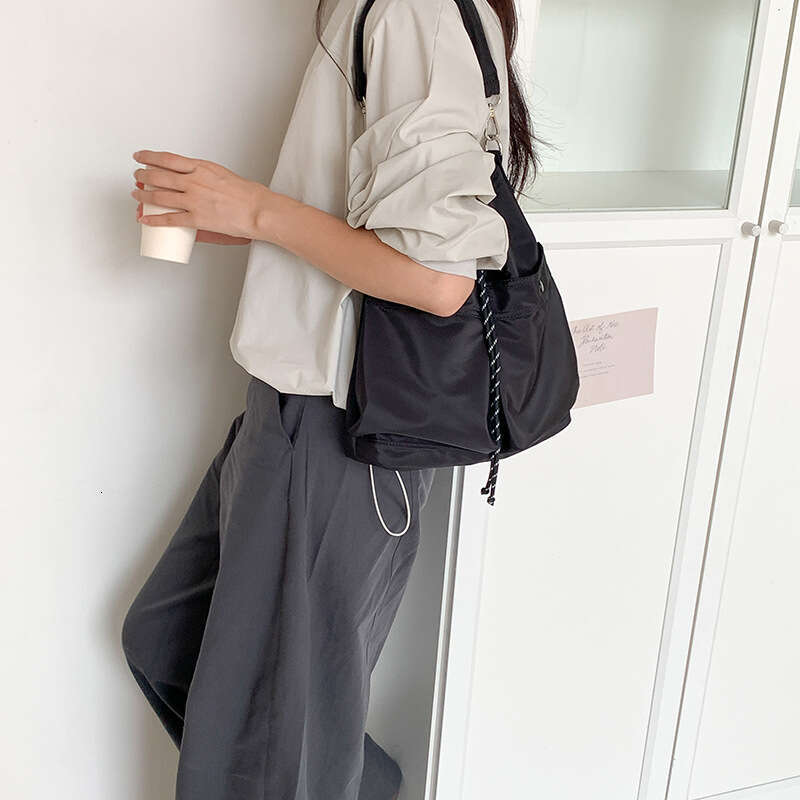 Nylon Commuter Tote for Women, Korean Japanese Style, 2025 Autumn and Winter New Drawstring Simple Versatile Shoulder Crossbody Bag