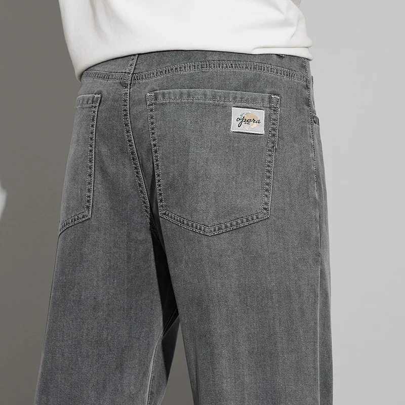 2025 New Lyocell Summer Thin Business Male Pants Jeans Mens High Waist Loose Comfortable Straight Elastic Denim Trousers W250905