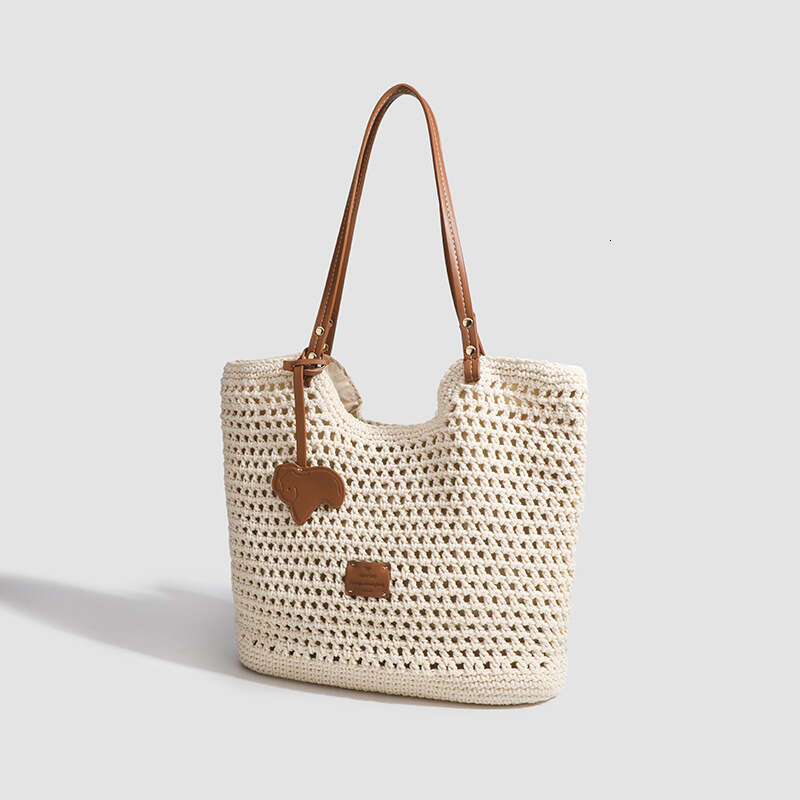 Shanxia Nanfeng Woven Women's Handheld Straw Large Capacity Beach Vacation Hollow Summer Shoulder Bag