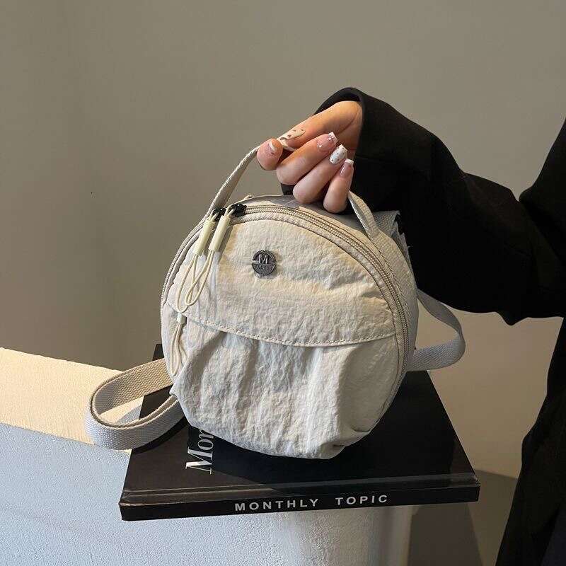 2025 New Fashion Commuter Canvas Round for Women, Niche Design Handheld Pleated Bag, Crossbody Shoulder Bag