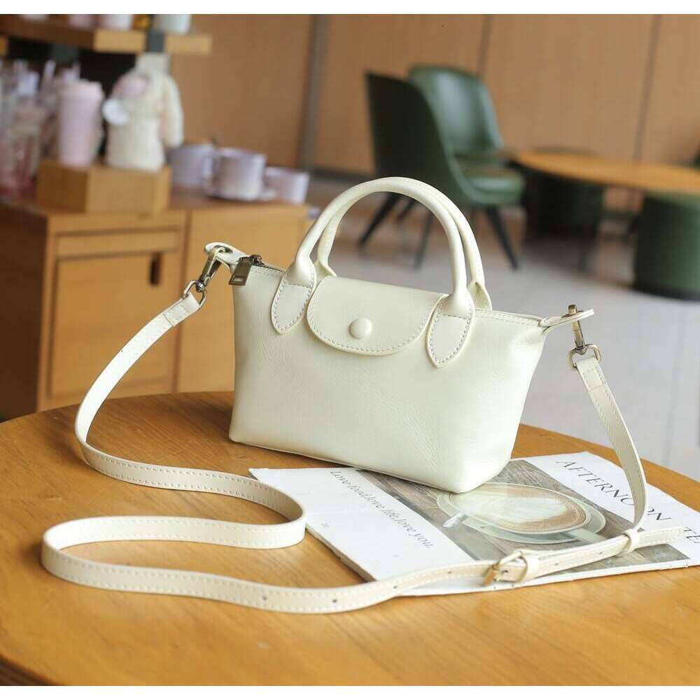 New Top Layer Vegetable Tanned Dumpling Versatile Women's Crossbody Small Bag Genuine Leather Handbag 77158