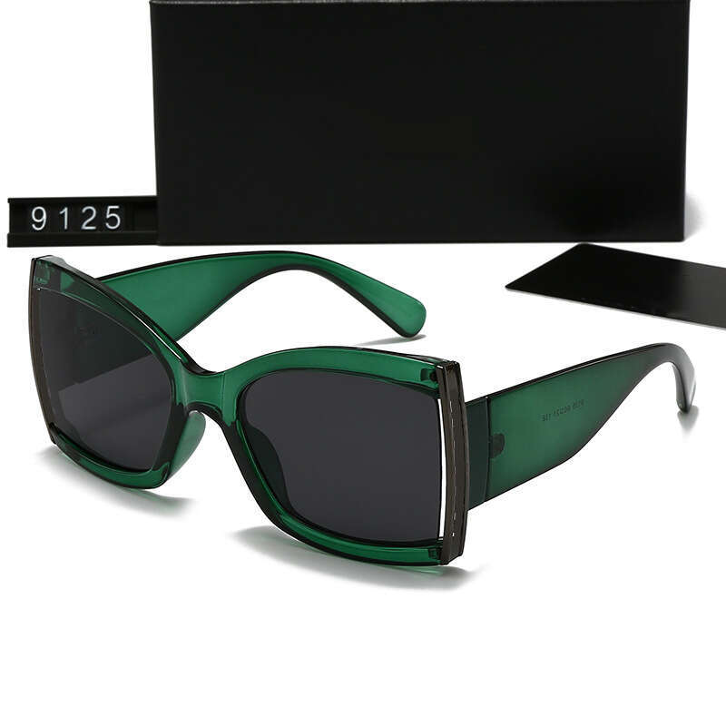 New Women's Fashion Trend Metal Leg Hollow Sunglasses UV Protection 9125 99a