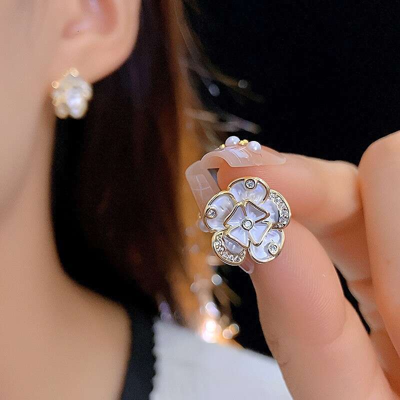 DH collections Exquisite Flower Shaped Ear Piercing - Friendly Stud Earrings for Women H260129