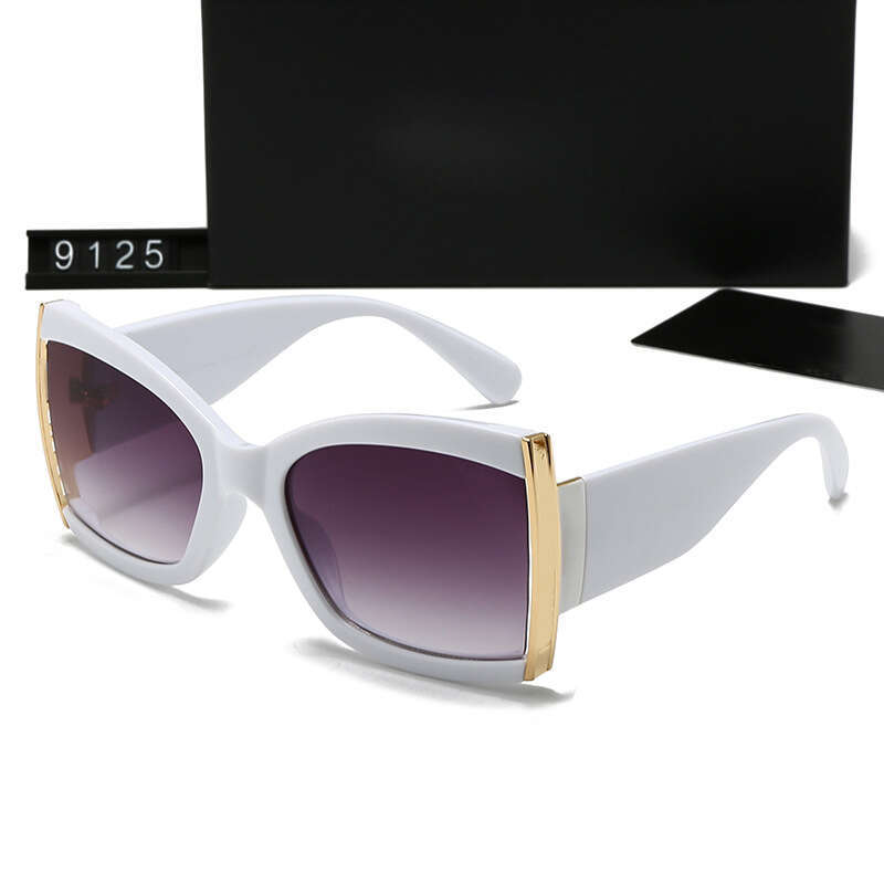 New Women's Fashion Trend Metal Leg Hollow Sunglasses UV Protection 9125 99a
