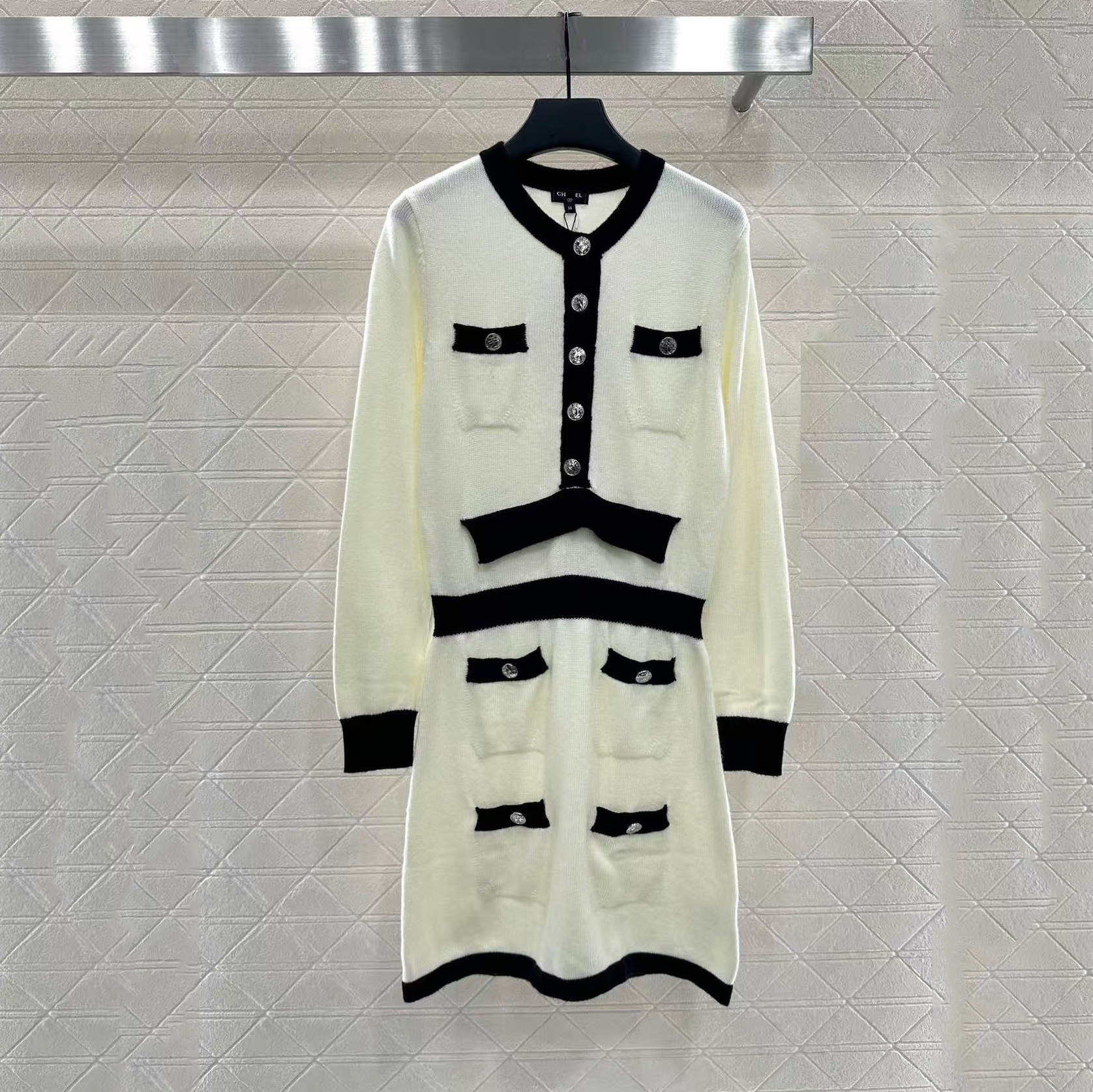 2026 New Women's Dress with Metal Button Sleeve Knitted Long Skirt Fashion Black and White Splicing Style