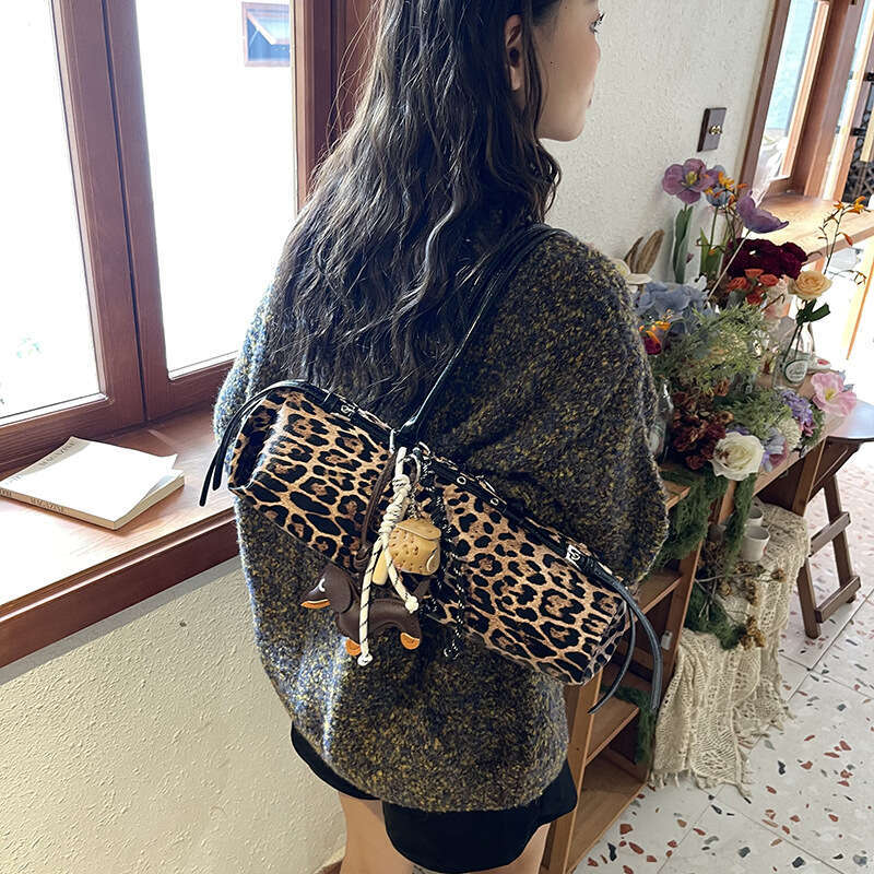 Leopard Print Bowling Women's New Fashion Versatile Niche Belt Buckle Long Strip Shoulder Underarm Baguette Bag