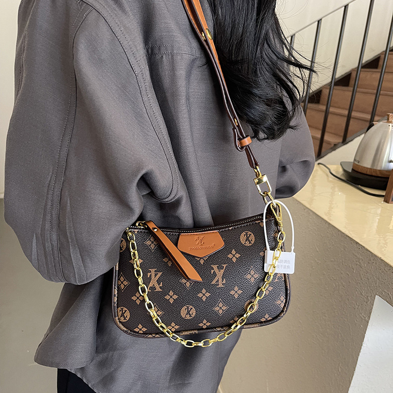 Free shipping new small bag female new senior sense of niche design all-go broadband crossbody bag
