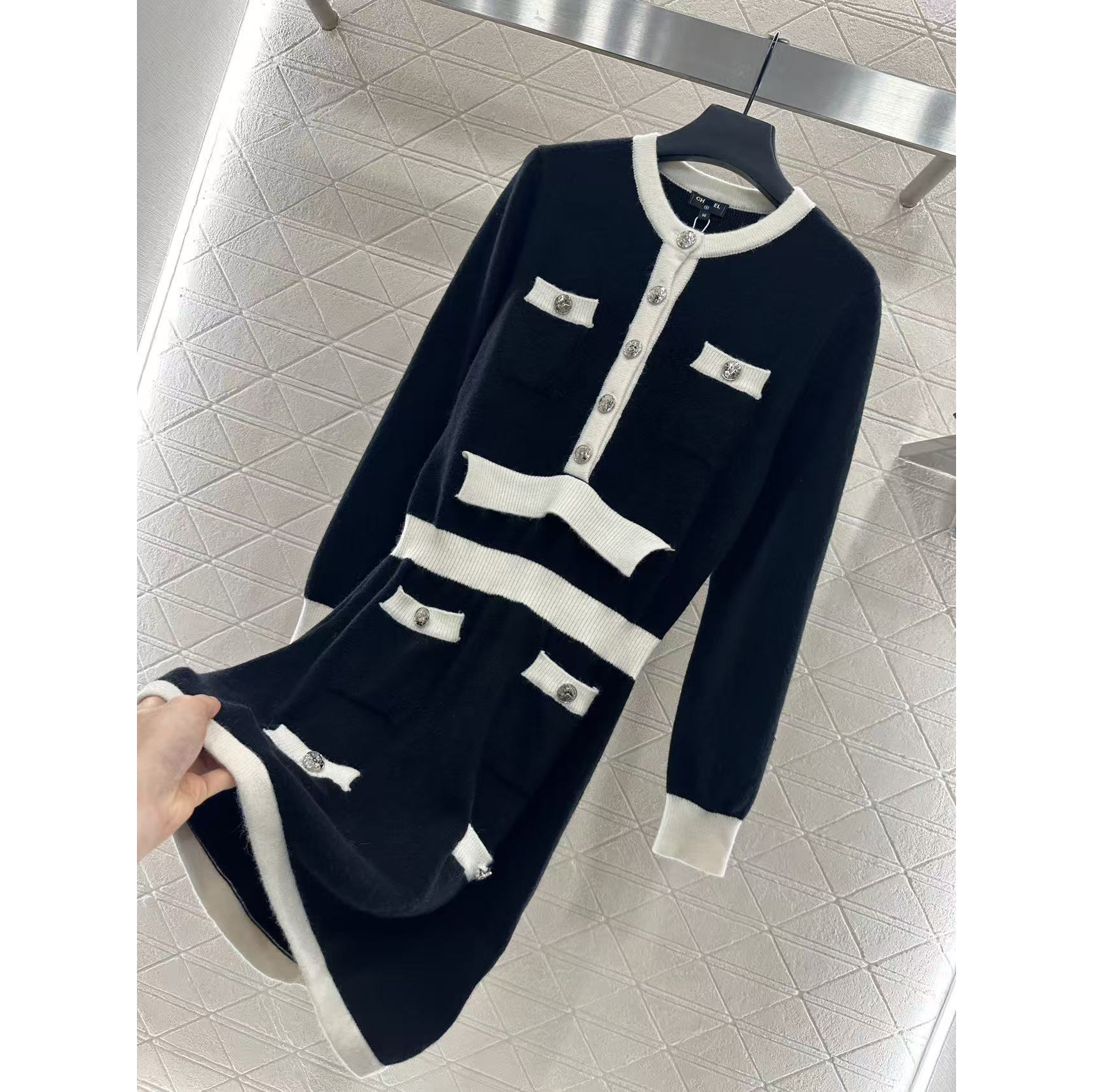 2026 New Women's Dress with Metal Button Sleeve Knitted Long Skirt Fashion Black and White Splicing Style