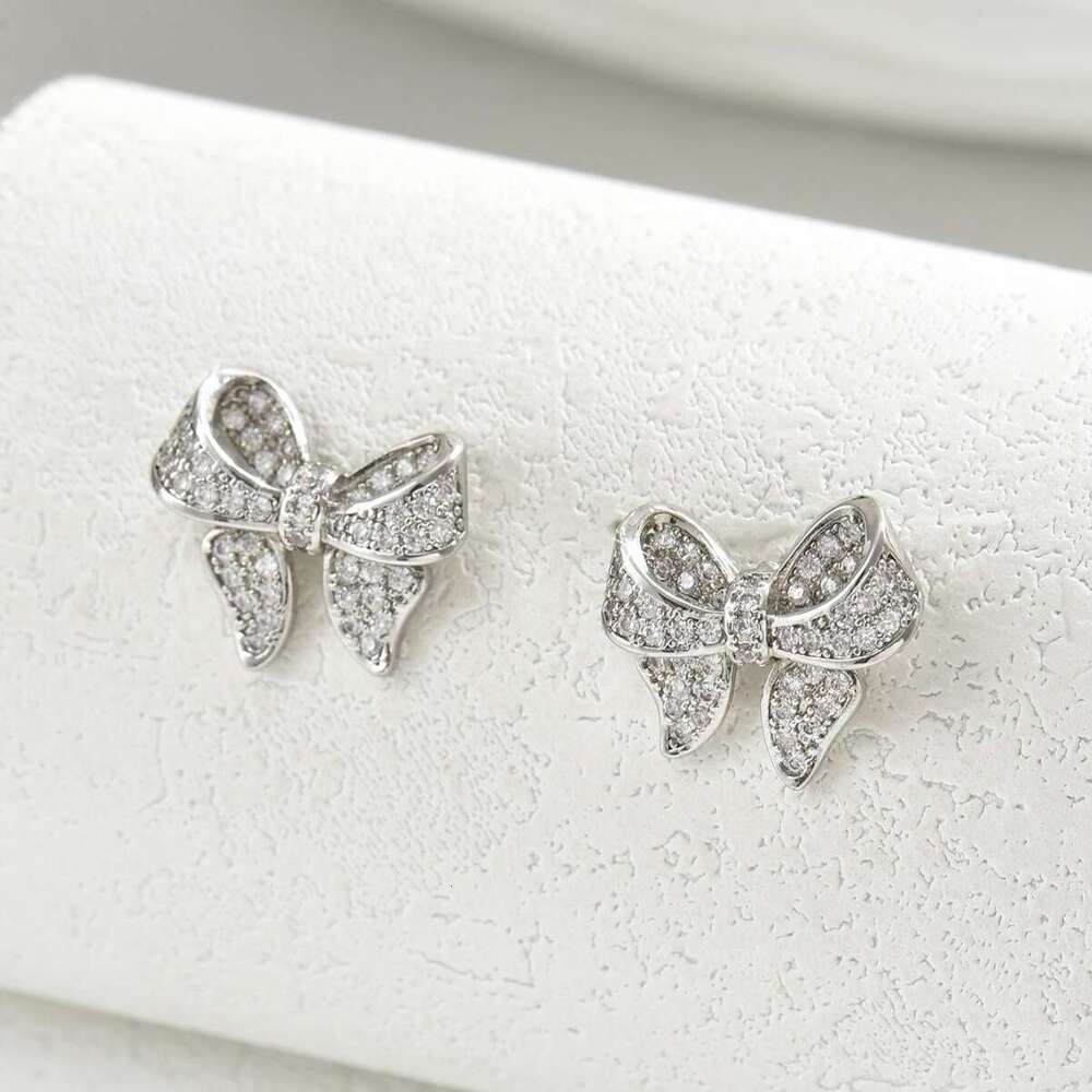DH collections:Niche Korean Style Sweet Fresh for Women Simple Inlaid Zircon Bowknot Design Stud Earrings Elegant Ear Jewelry