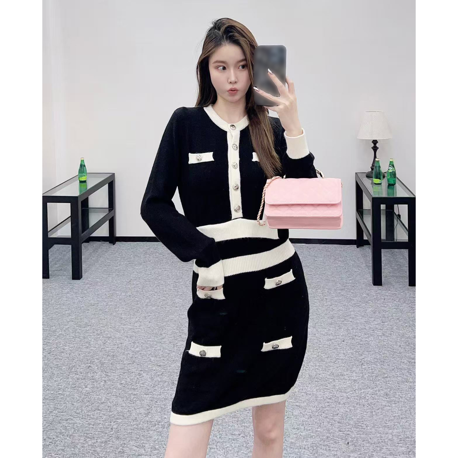 2026 New Women's Dress with Metal Button Sleeve Knitted Long Skirt Fashion Black and White Splicing Style