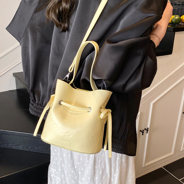 Women s Crossbody Bag Bucket Bag Niche Drawstring Shiny Face Handbag Autumn New Style Minimalist Designer Bag Women s Shoulder Bag