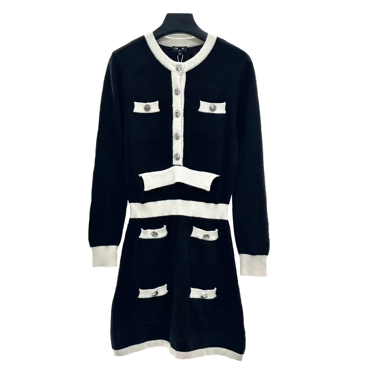 2026 New Women's Dress with Metal Button Sleeve Knitted Long Skirt Fashion Black and White Splicing Style