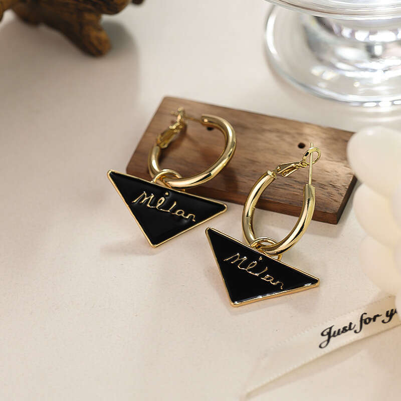 DH collections Oil Drop Triangle Letter Sier Needle French Style Elegant Design Sense Hoop Simple Versatile Earrings Trendy