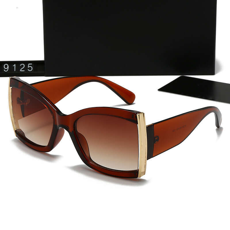 New Women's Fashion Trend Metal Leg Hollow Sunglasses UV Protection 9125 99a