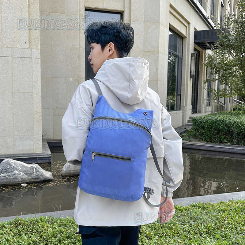 Skin Bag Large Capacity Ultralight Portable Folding Bag Mens Sports Backpack with Earphone Outdoor Travel Backpack H250906