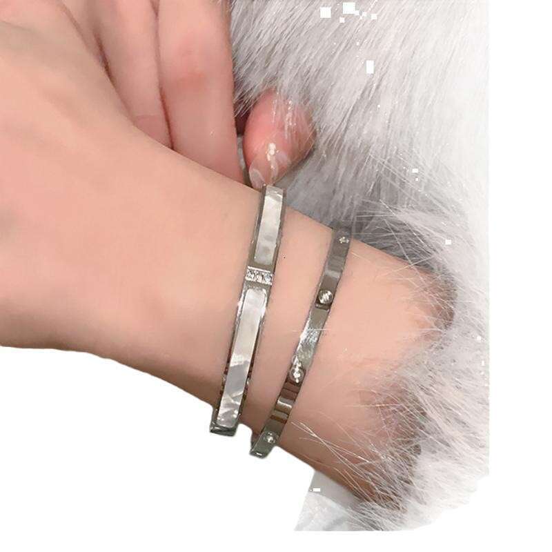 DH collections: High - end White Mother - of - Pearl Bracelets for Women - Sparkling Diamond - set Stainless - steel Jewelry