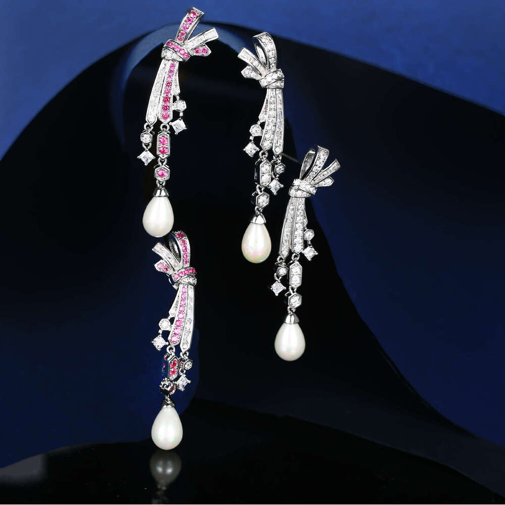 DH collections: Otina Bowknot Tassel Pearl Shape Studs for Women Sier Needle Light Fashion Elegant Earrings